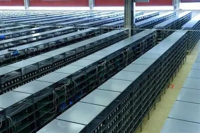 Inside a large mining farm, showing the organized arrangement of servers.