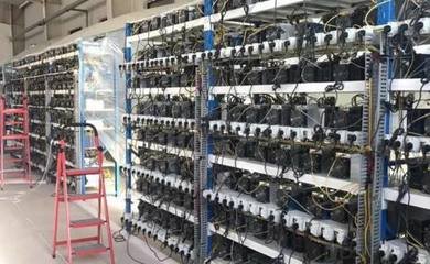 Vast cryptocurrency mining farm with rows of ASIC machines